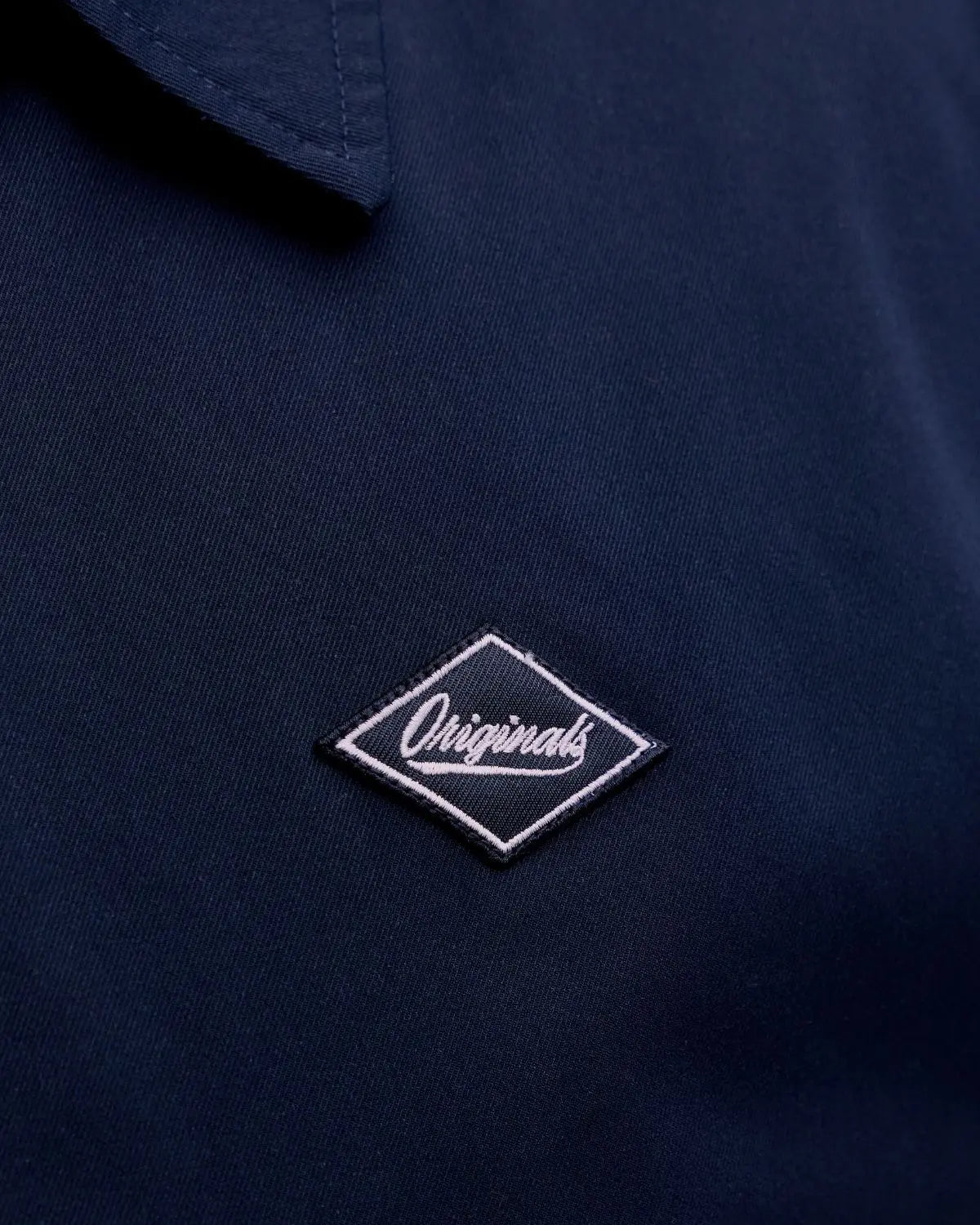 Pánská lehká přechodná bunda s vodoodpudivou úpravou Jack &amp; Jones 12292980 tmavě modrá